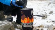 WILD-WIND X0 Lightweight Camping Stove System with 1 Liter Pot; One-Piece Design, Propane (package includes additional orange cozy and lid)